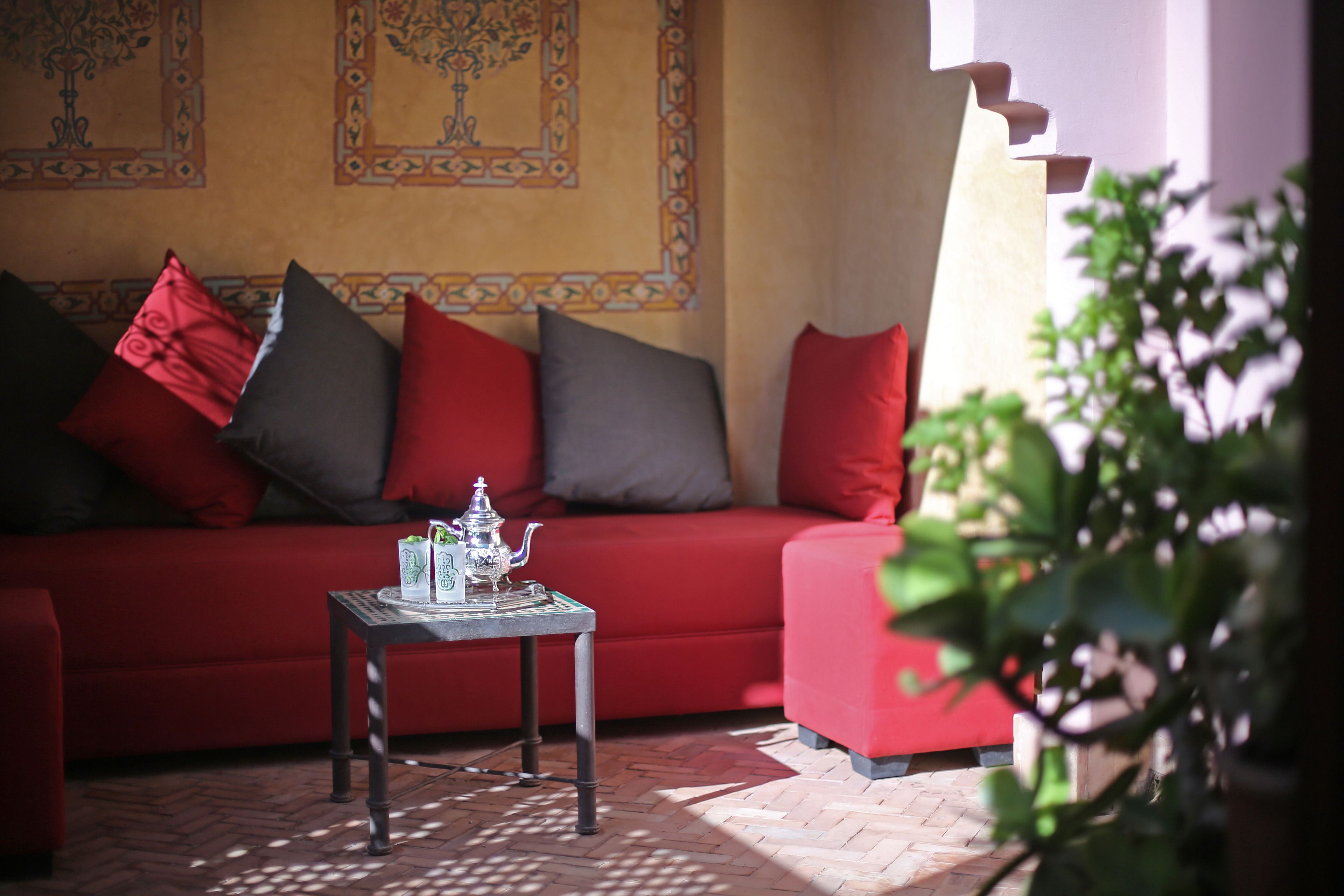 deluxe room, patio | living area | flat-screen tv, dvd player