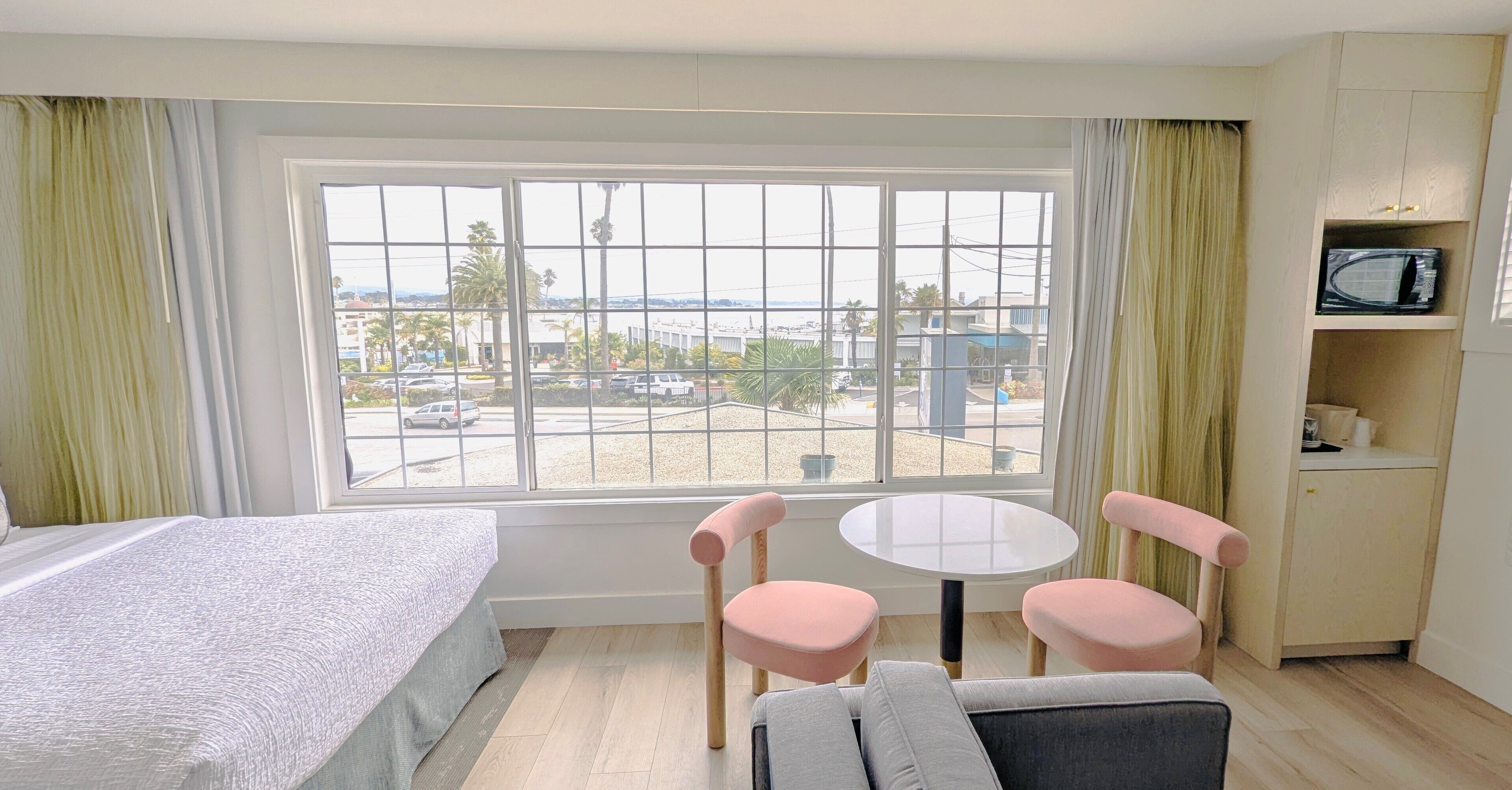 panoramic room, multiple beds, non smoking, ocean view | 1 bedroom, iron/ironing board, free wifi, bed sheets