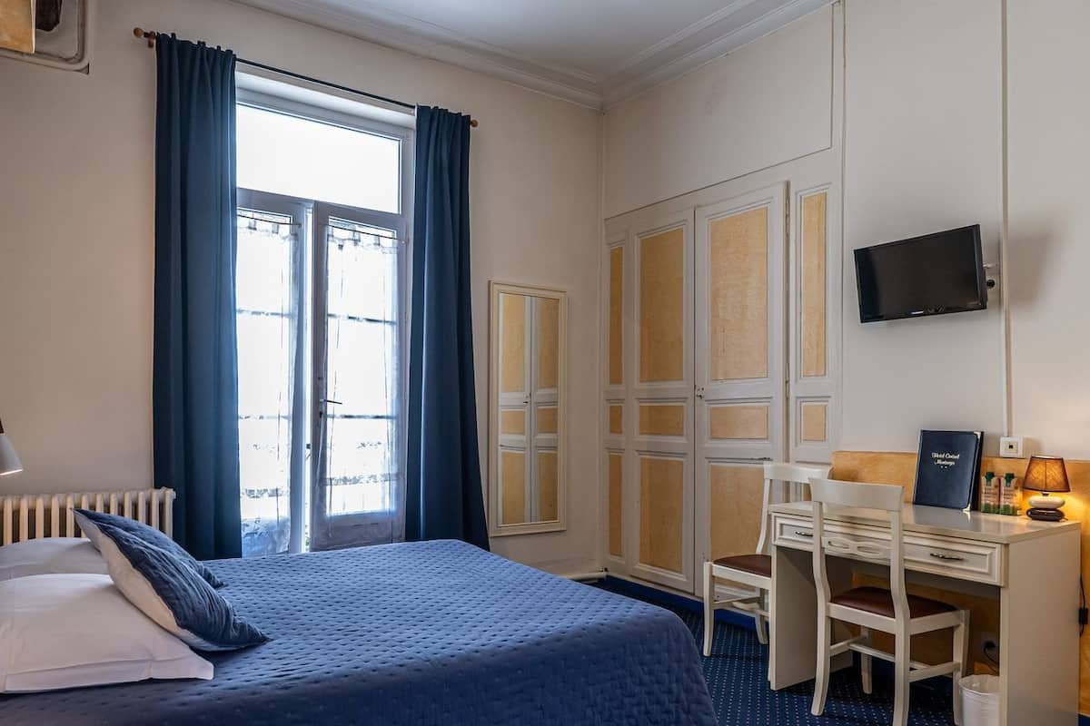 double room | individually decorated, desk, blackout curtains, cots/infant beds