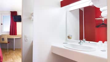 Shower, eco-friendly toiletries, hair dryer, towels