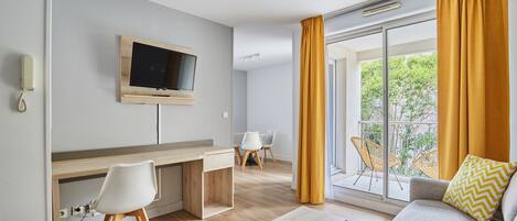 In-room safe, desk, laptop workspace, blackout curtains