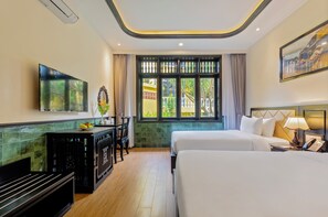 Habitación superior con 2 camas individuales, 2 camas individuales, vista al jardín | Ropa de cama hipoalergénica y minibar 