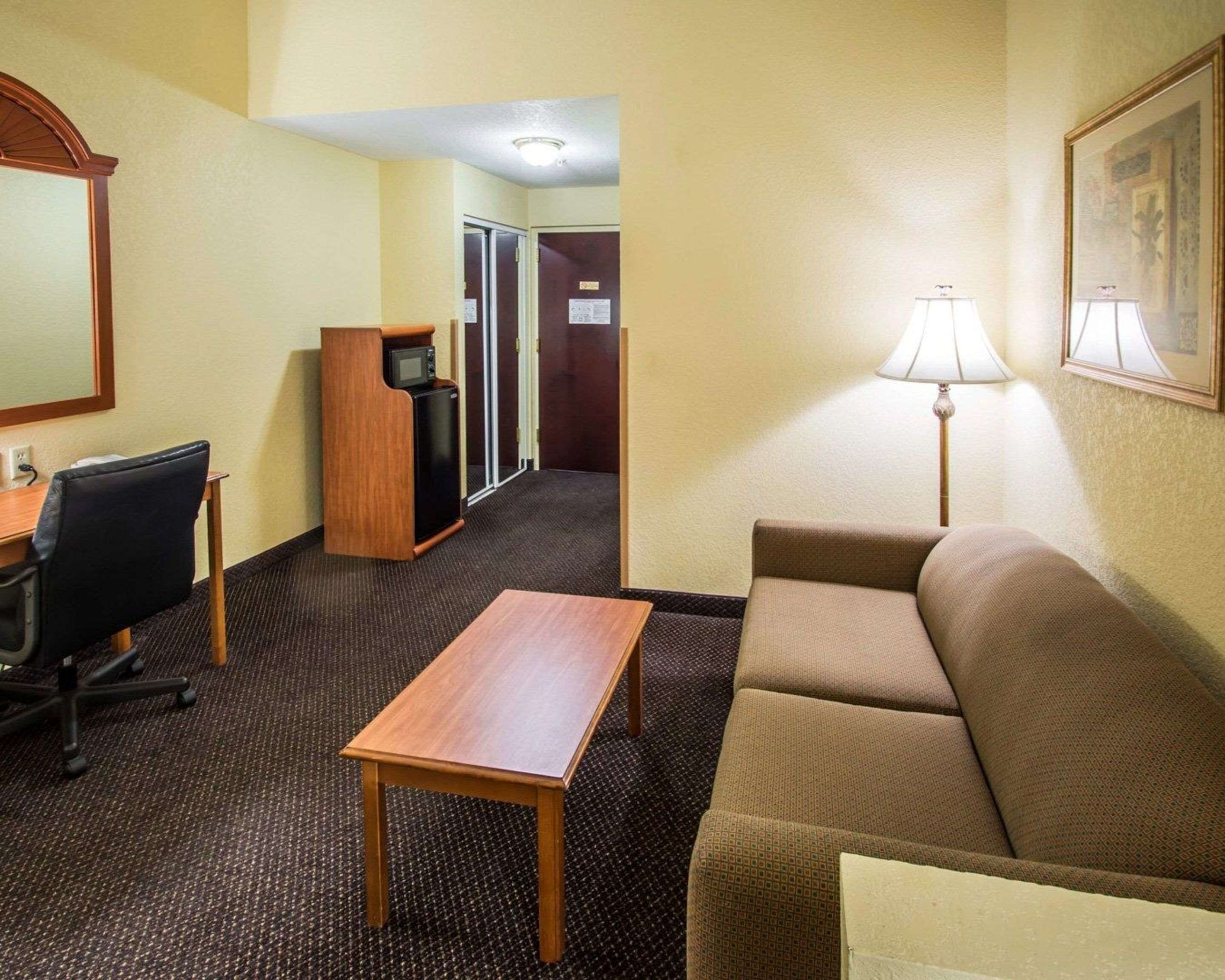suite, 1 king bed, non smoking | in-room safe, desk, iron/ironing board, cots/infant beds