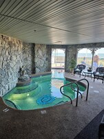 Indoor pool, outdoor pool, pool umbrellas
