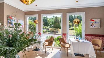 Dinner served, French cuisine, garden views