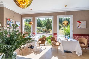 Dinner served, French cuisine, garden views 