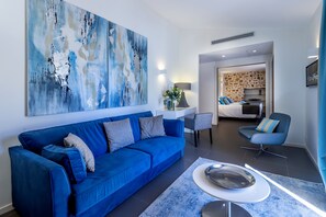 Suite, Terrace | Minibar, in-room safe, desk, iron/ironing board - Hôtel Golf & Spa Château de la Bégude, The Originals Collection (Opio)