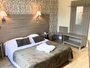 Desk, laptop workspace, free WiFi, bed sheets