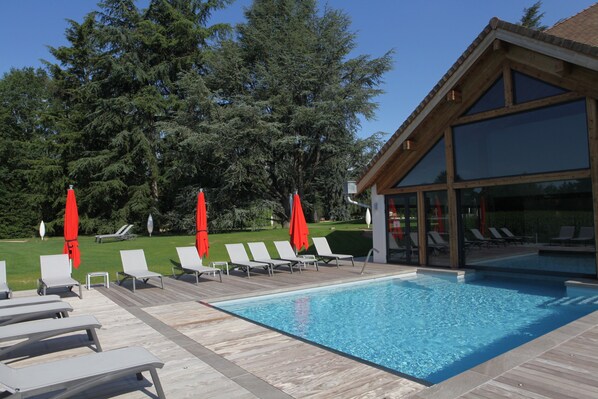 Indoor pool, outdoor pool, open 7:30 AM to 9:00 PM, pool umbrellas