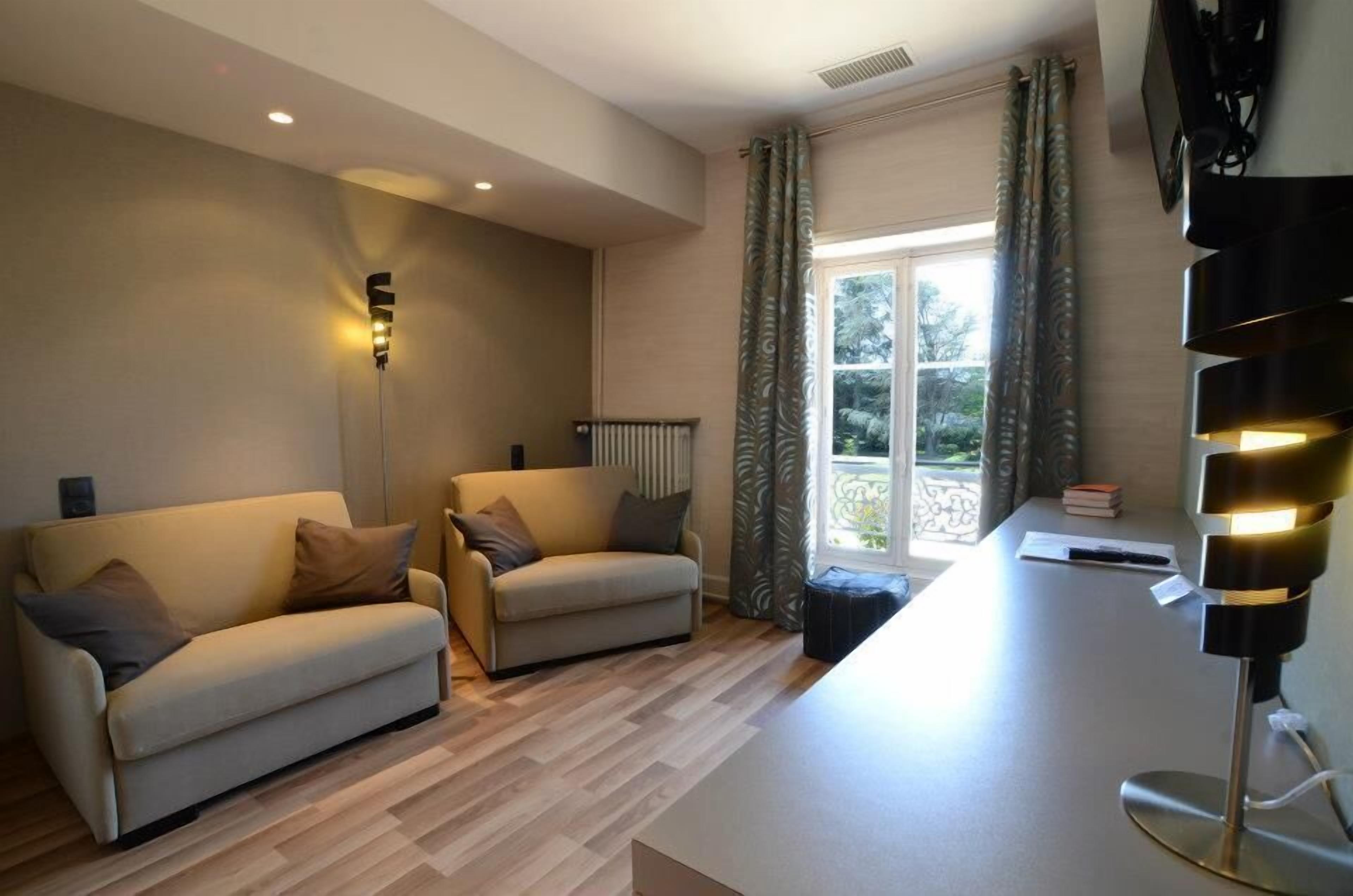 Family Triple Room | Living area