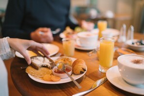 Daily buffet breakfast (EUR 22 per person)