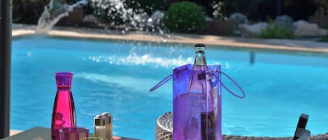 Outdoor pool, pool umbrellas, pool loungers