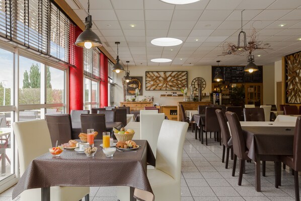 Daily buffet breakfast (EUR 12.9 per person)