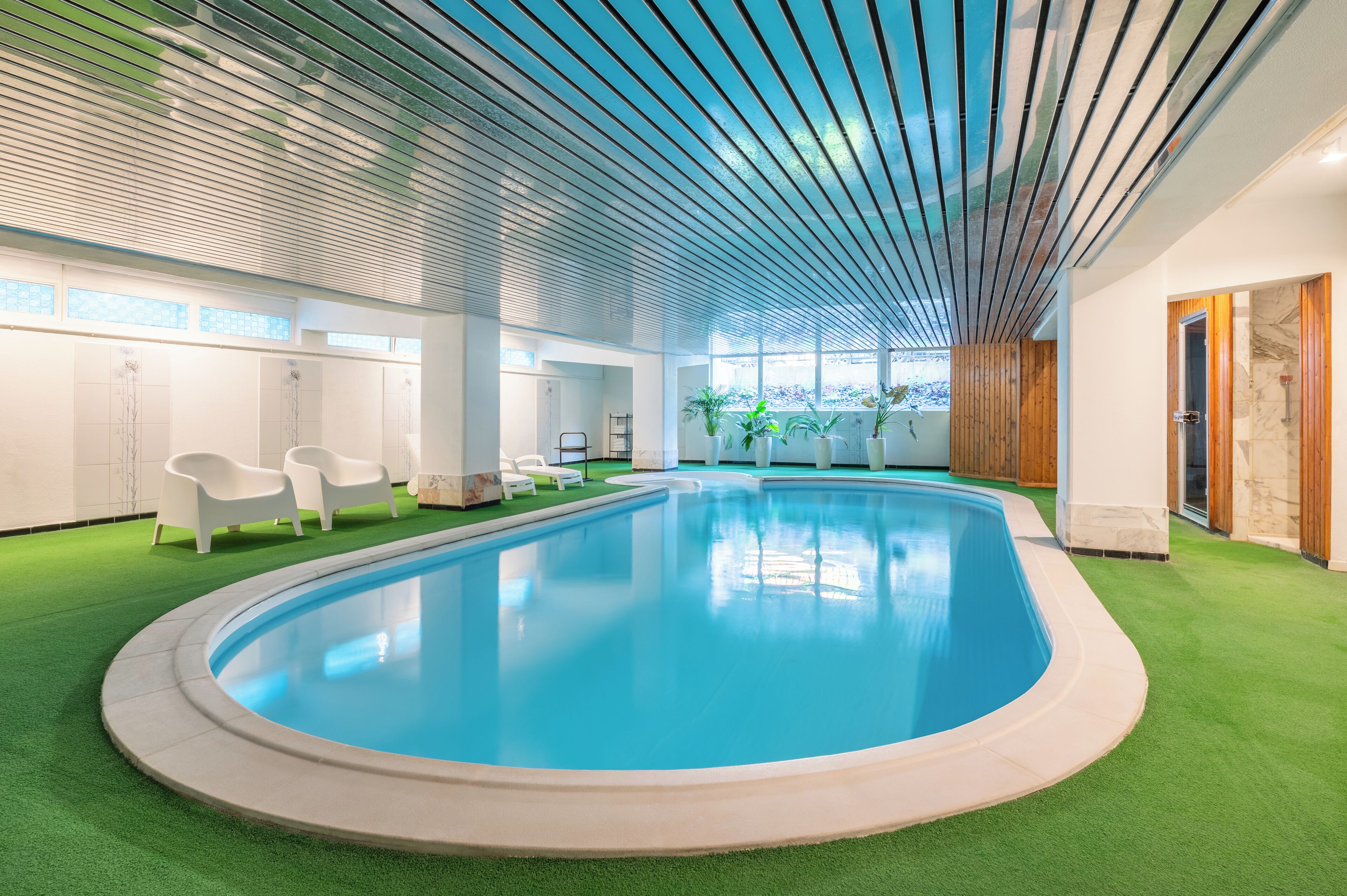 indoor pool, open 7:30 am to 9:00 pm, pool loungers