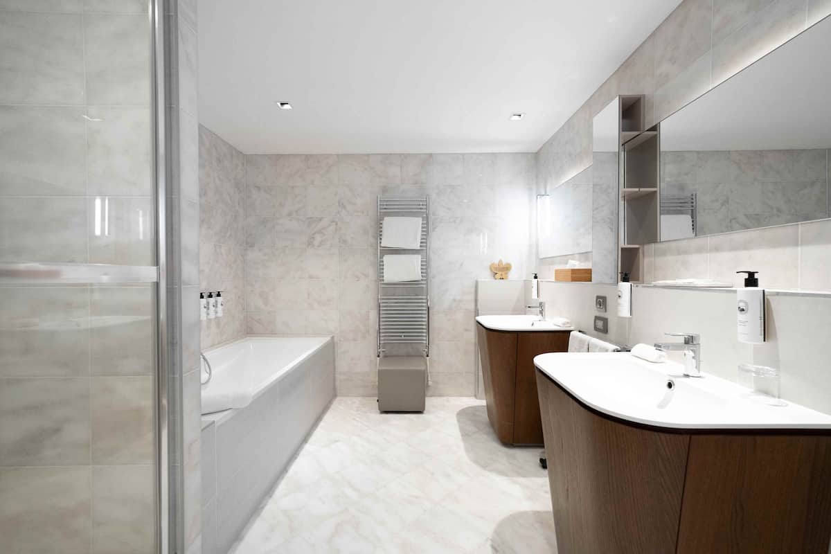 large double room | bathroom | separate bathtub and shower, jetted bath, free toiletries, hair dryer