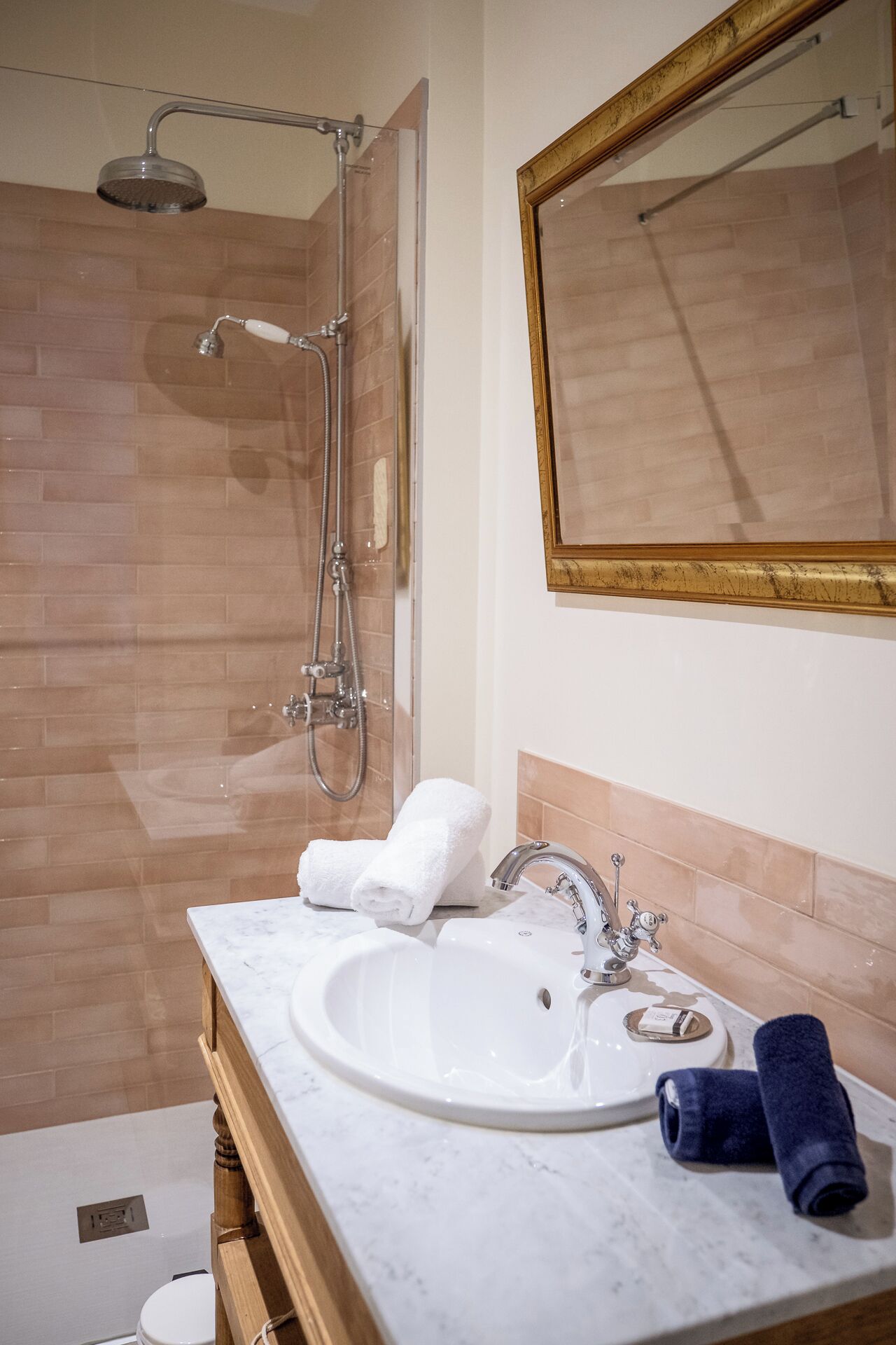 superior triple room | bathroom | hair dryer, towels, soap, shampoo