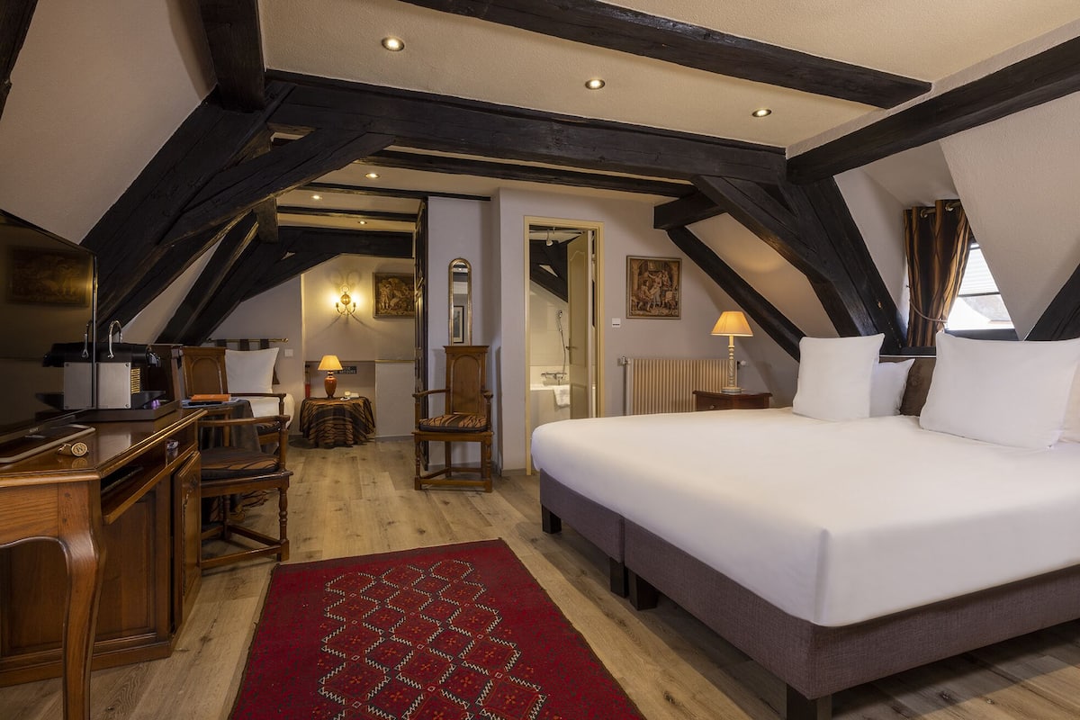 Habitación triple Confort | Ropa de cama de alta calidad, camas Tempur-Pedic y minibar