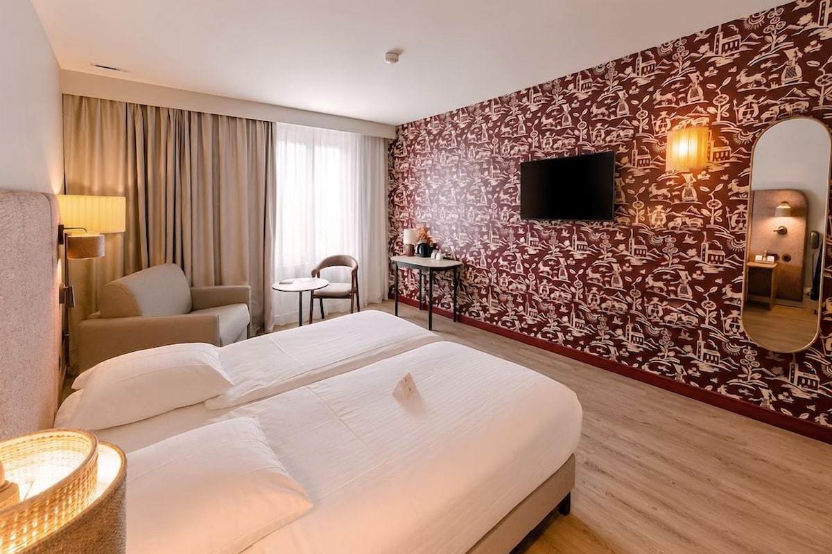 Premium bedding, desk, laptop workspace, soundproofing