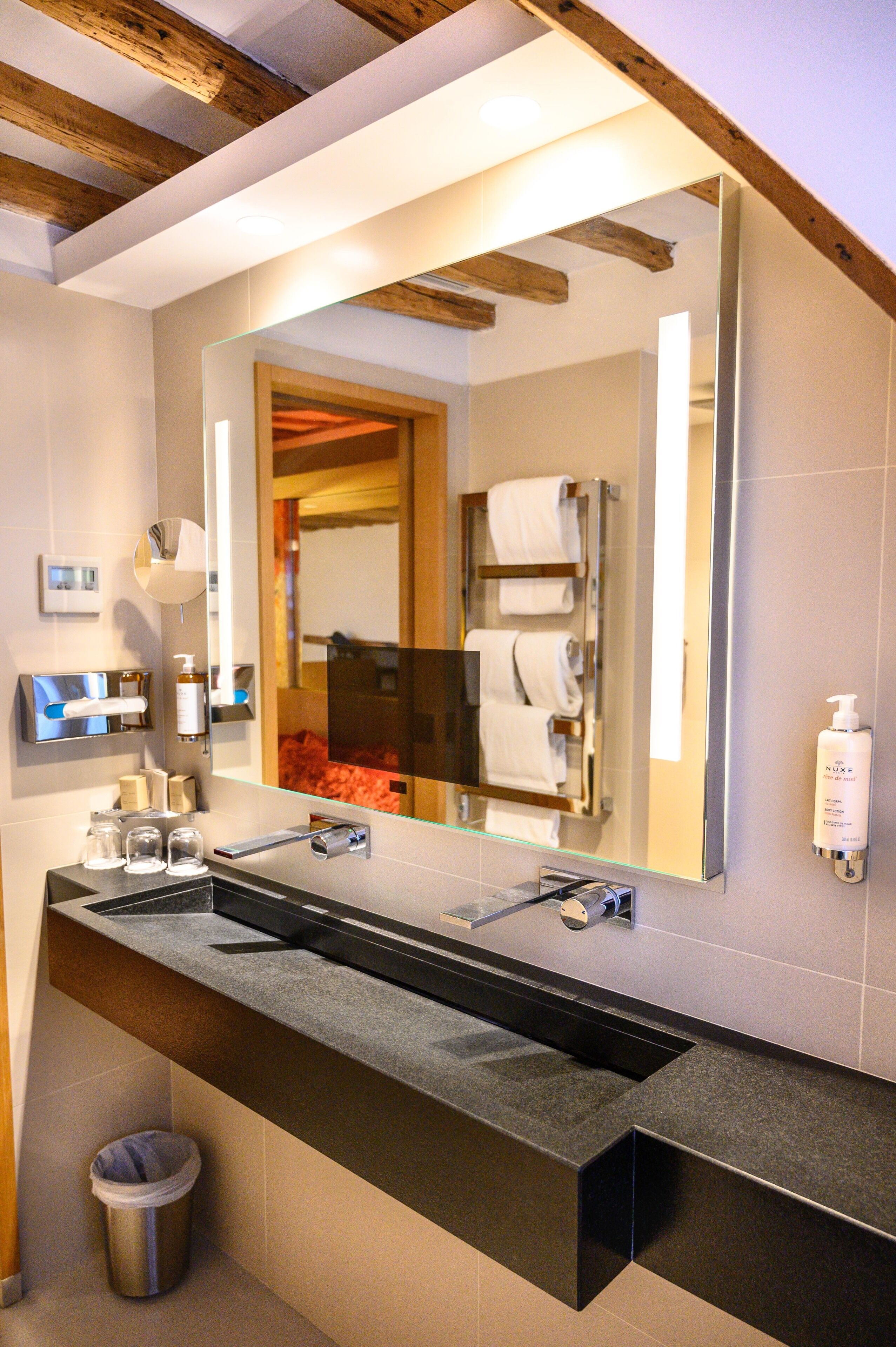 junior suite, 1 bedroom, city view | bathroom | hair dryer, bathrobes, slippers, towels