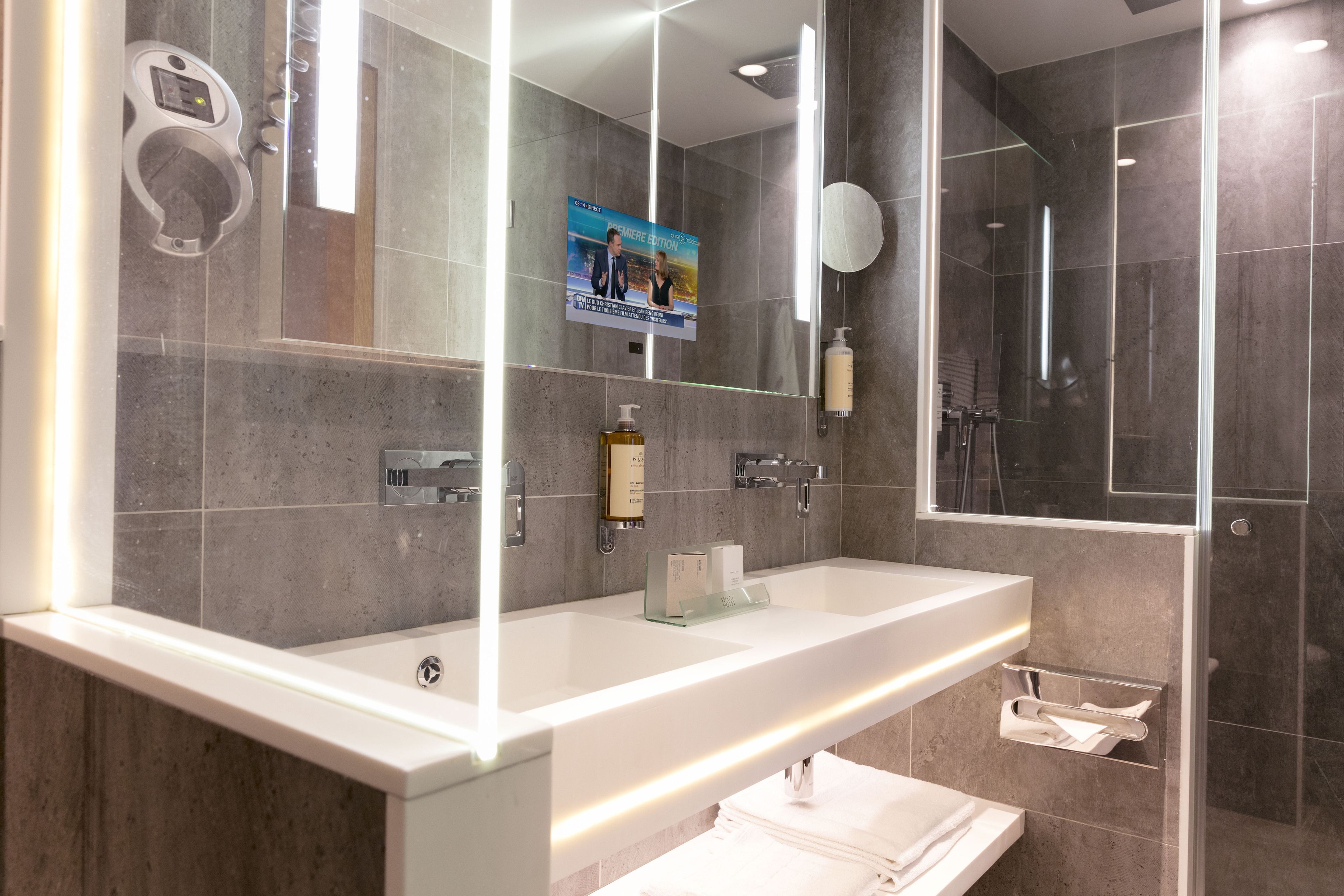 hair dryer, bathrobes, slippers, towels