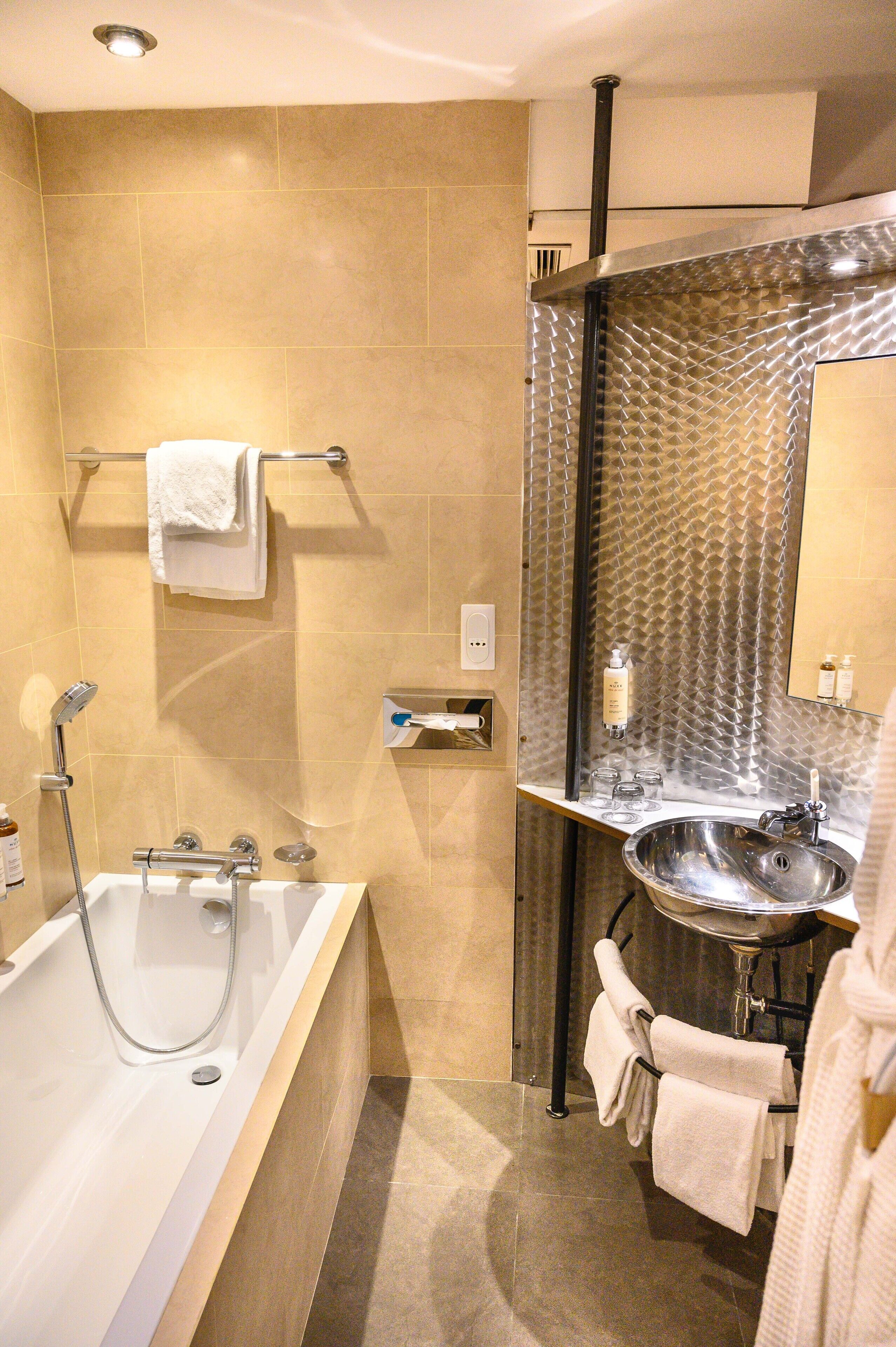 suite | bathroom | hair dryer, bathrobes, slippers, towels