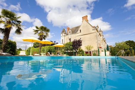 Seasonal outdoor pool. Chateau de la Verie