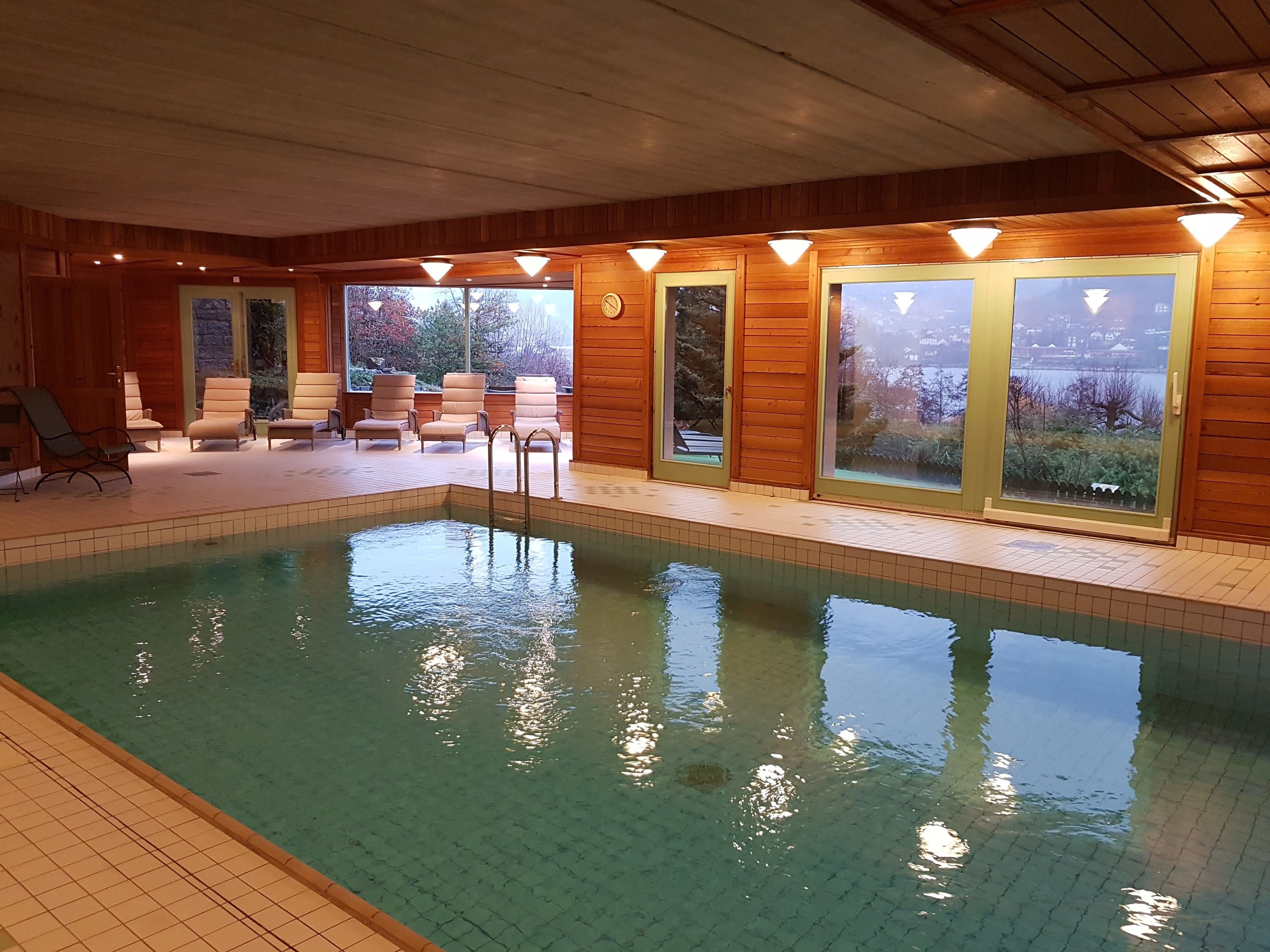 indoor pool, open 9:00 am to 7:00 pm, pool loungers