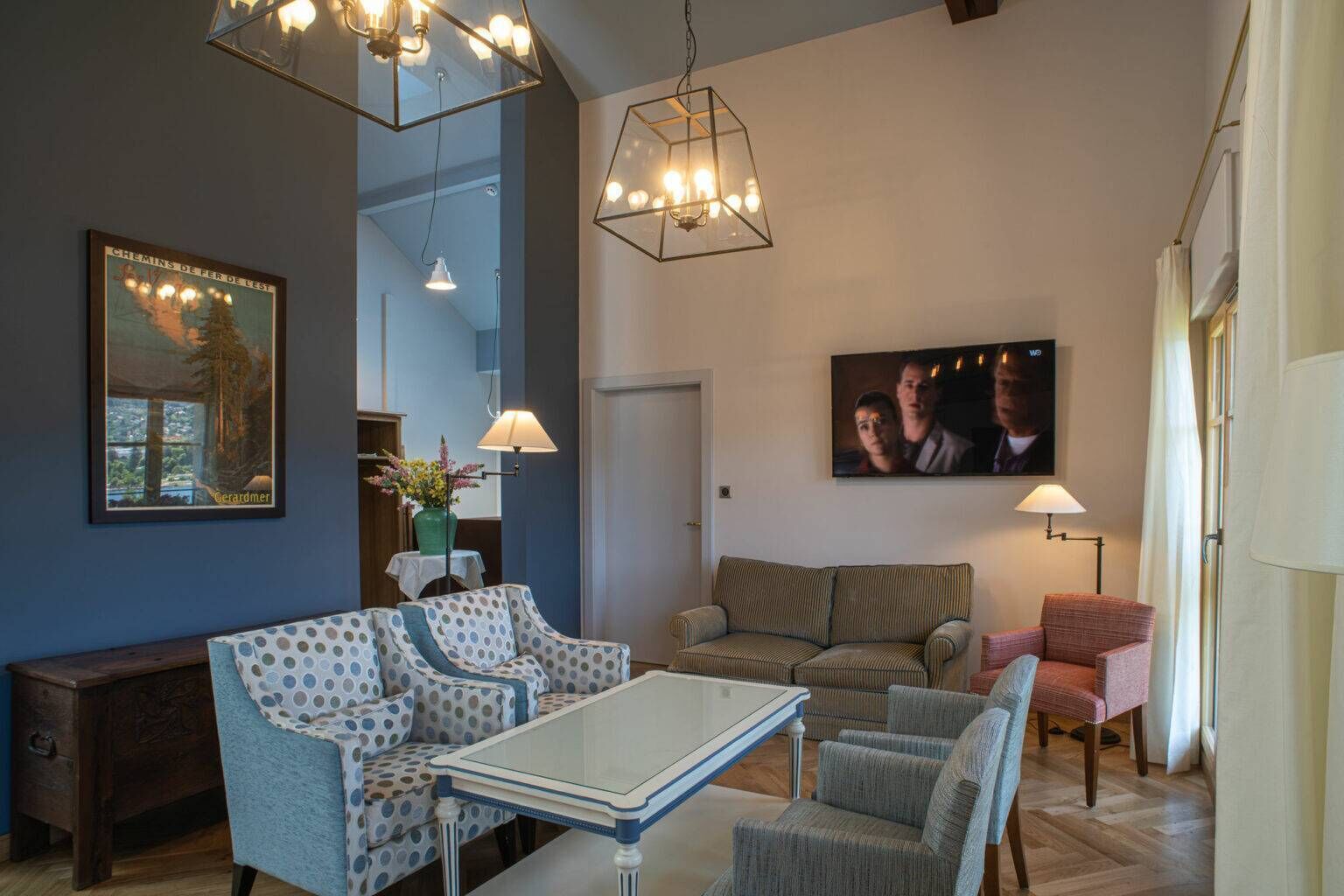 luxury apartment, 2 bedrooms, lake view | living area | flat-screen tv