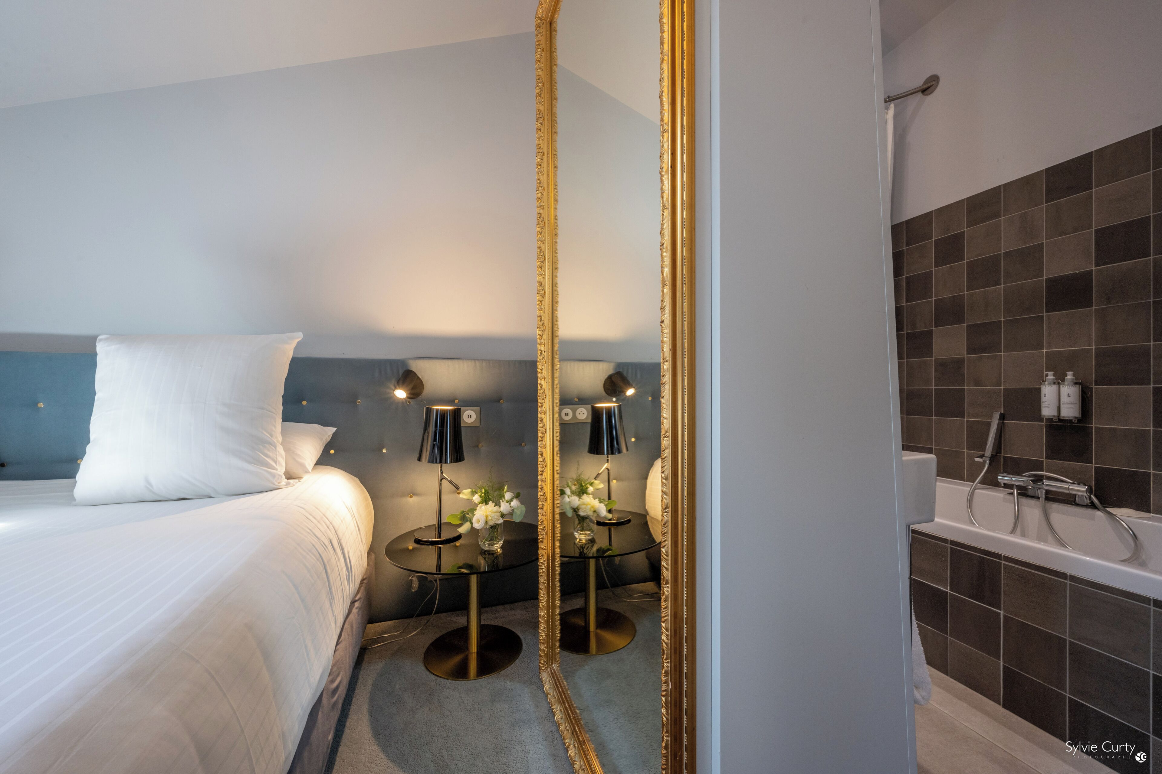 suite la sirène | bathroom | designer toiletries, hair dryer, bathrobes, slippers