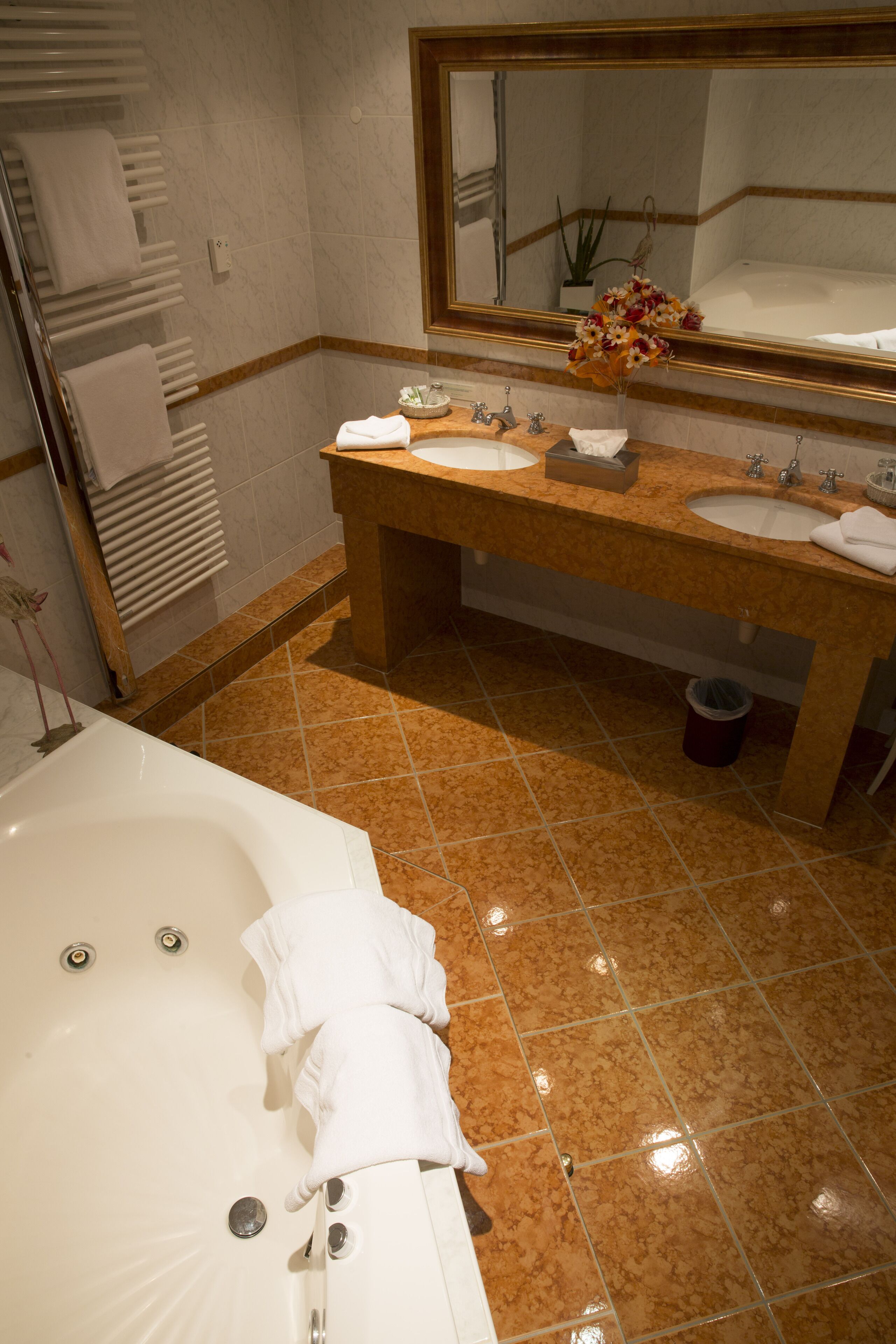 luxury suite (duplex) | bathroom | hair dryer, bathrobes, slippers, towels