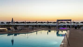 Seasonal outdoor pool, pool umbrellas, pool loungers