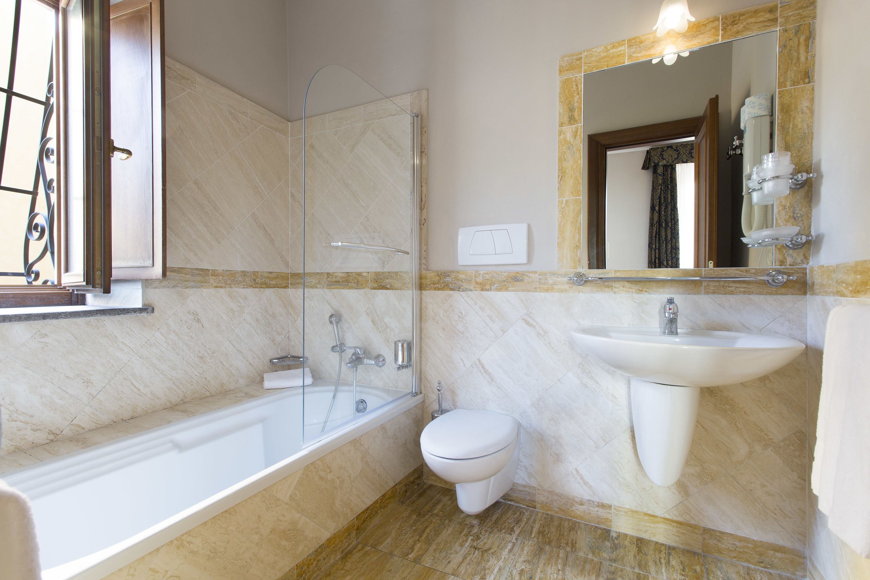 comfort triple room | bathroom | shower, hair dryer, bidet, towels