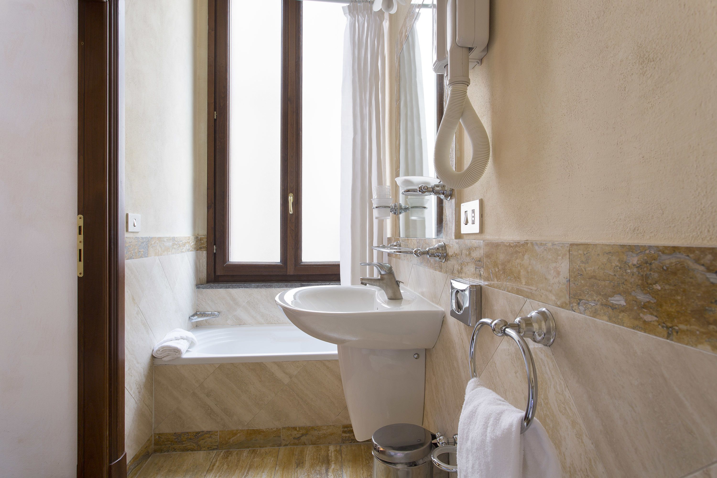 superior twin room | bathroom | shower, hair dryer, bidet, towels