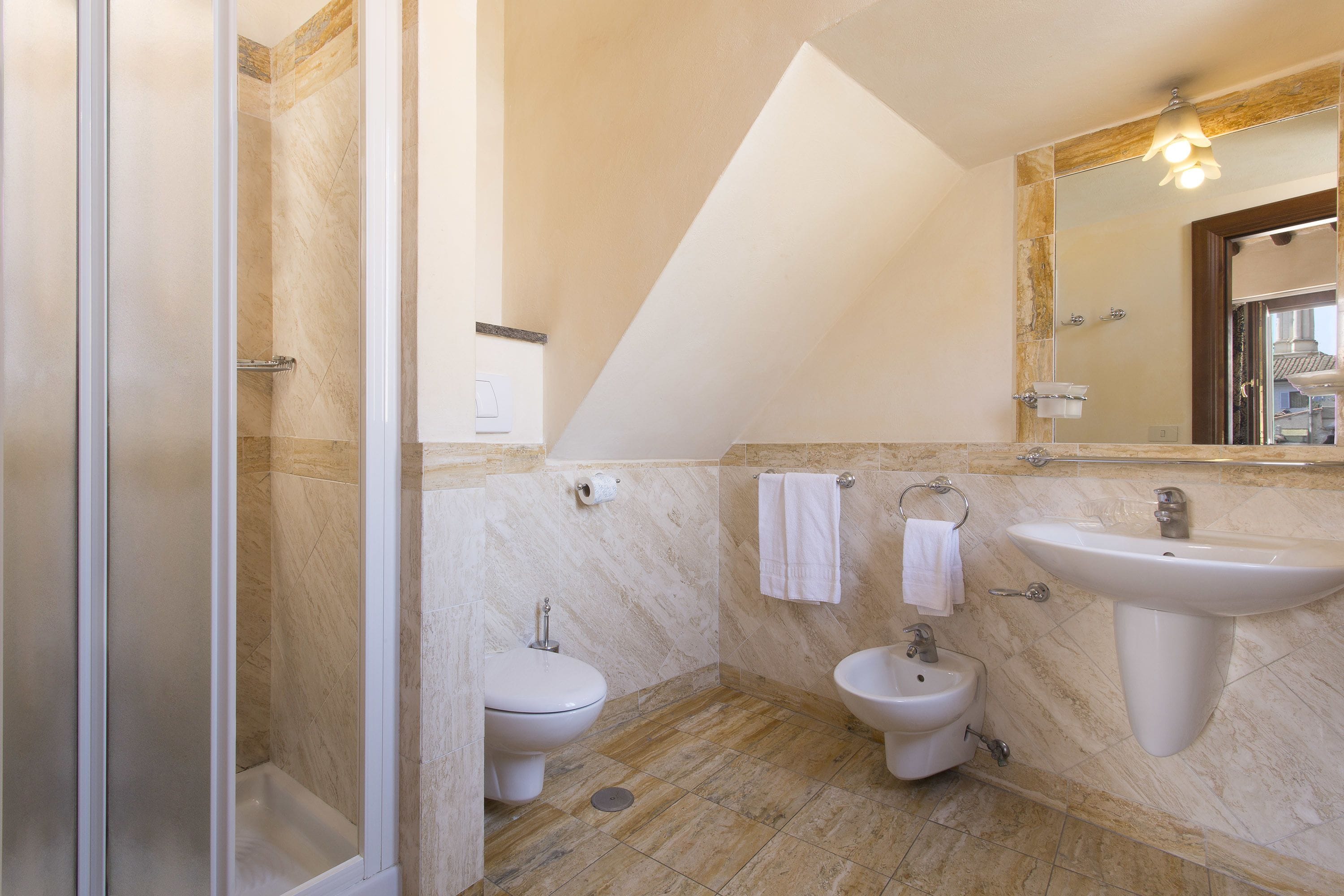 deluxe triple room, terrace | bathroom | shower, hair dryer, bidet, towels
