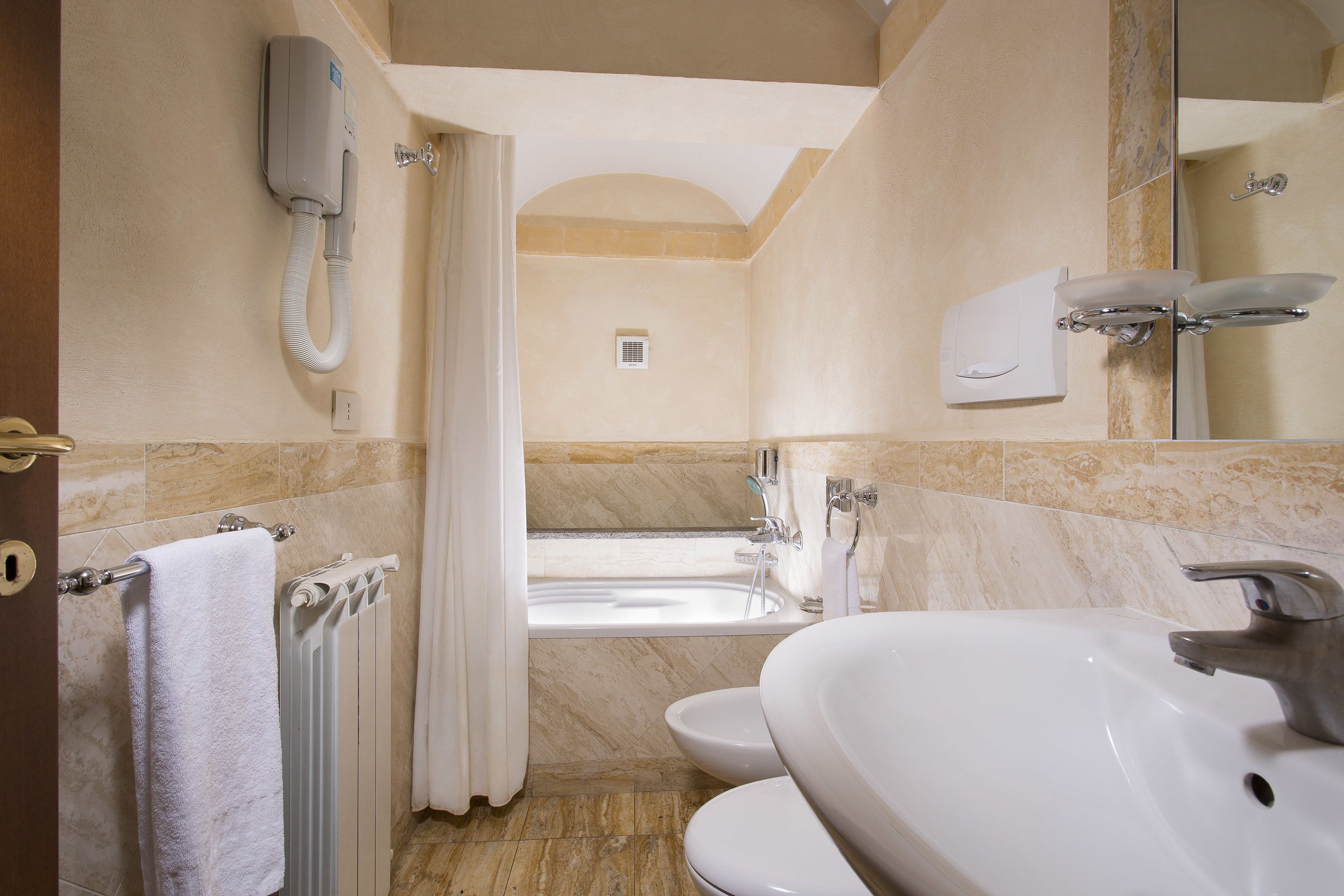 comfort single room | bathroom | shower, hair dryer, bidet, towels
