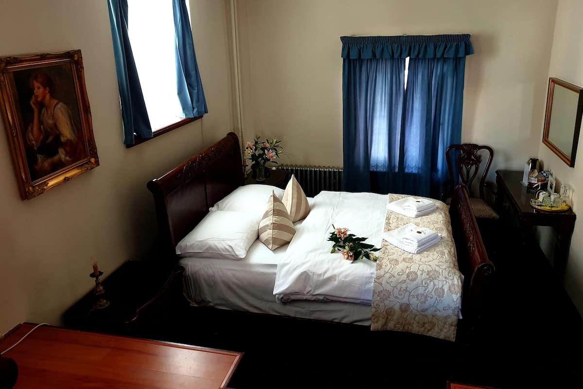 Suite Romantica, 2 camere da letto | Ferro/asse da stiro, Wi-Fi gratuito, lenzuola