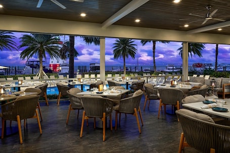 4 restaurants, breakfast, lunch, dinner served; Caribbean cuisine. Faro Blanco Resort Marathon Florida Keys, Curio by Hilton
