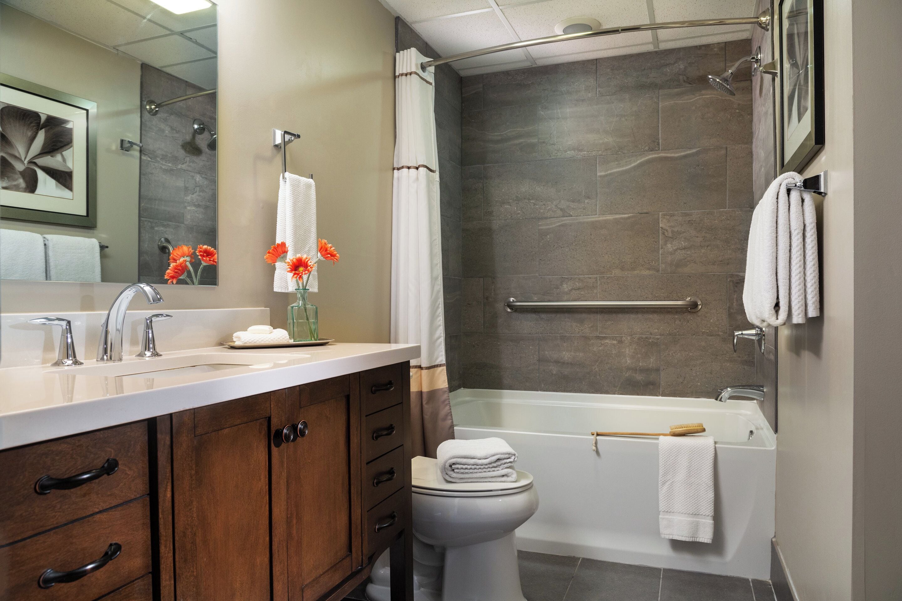 designer toiletries, hair dryer, towels, shampoo