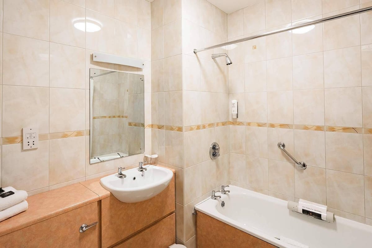 shower, free toiletries, hair dryer, towels