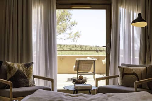 Suite Junior Soleilla | Free minibar items, in-room safe, desk, blackout curtains