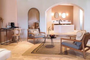 Suite Soleilla | Free minibar items, in-room safe, desk, blackout drapes