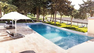 Seasonal outdoor pool, pool umbrellas, pool loungers