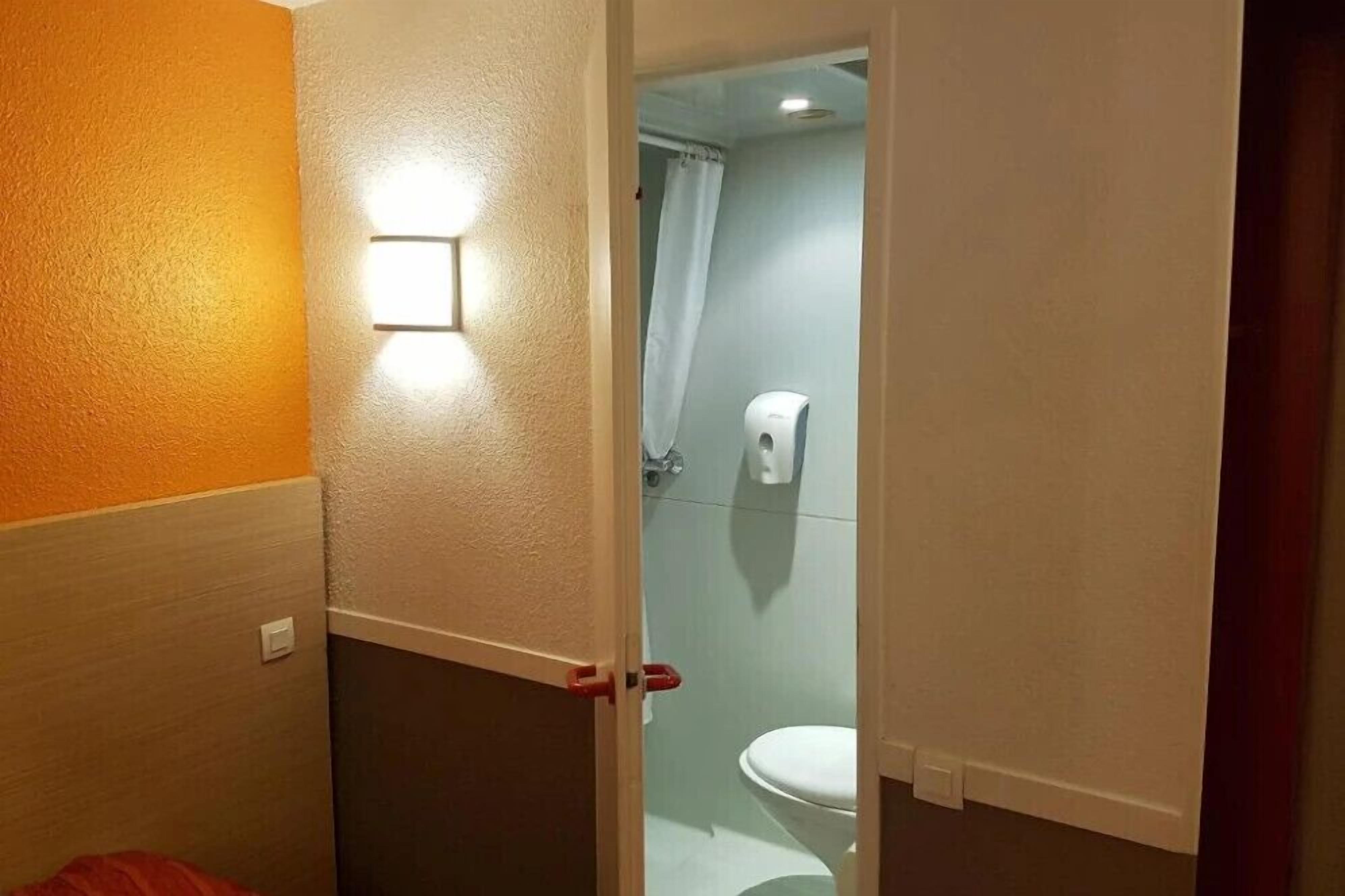 Desk, laptop workspace, blackout drapes, free WiFi