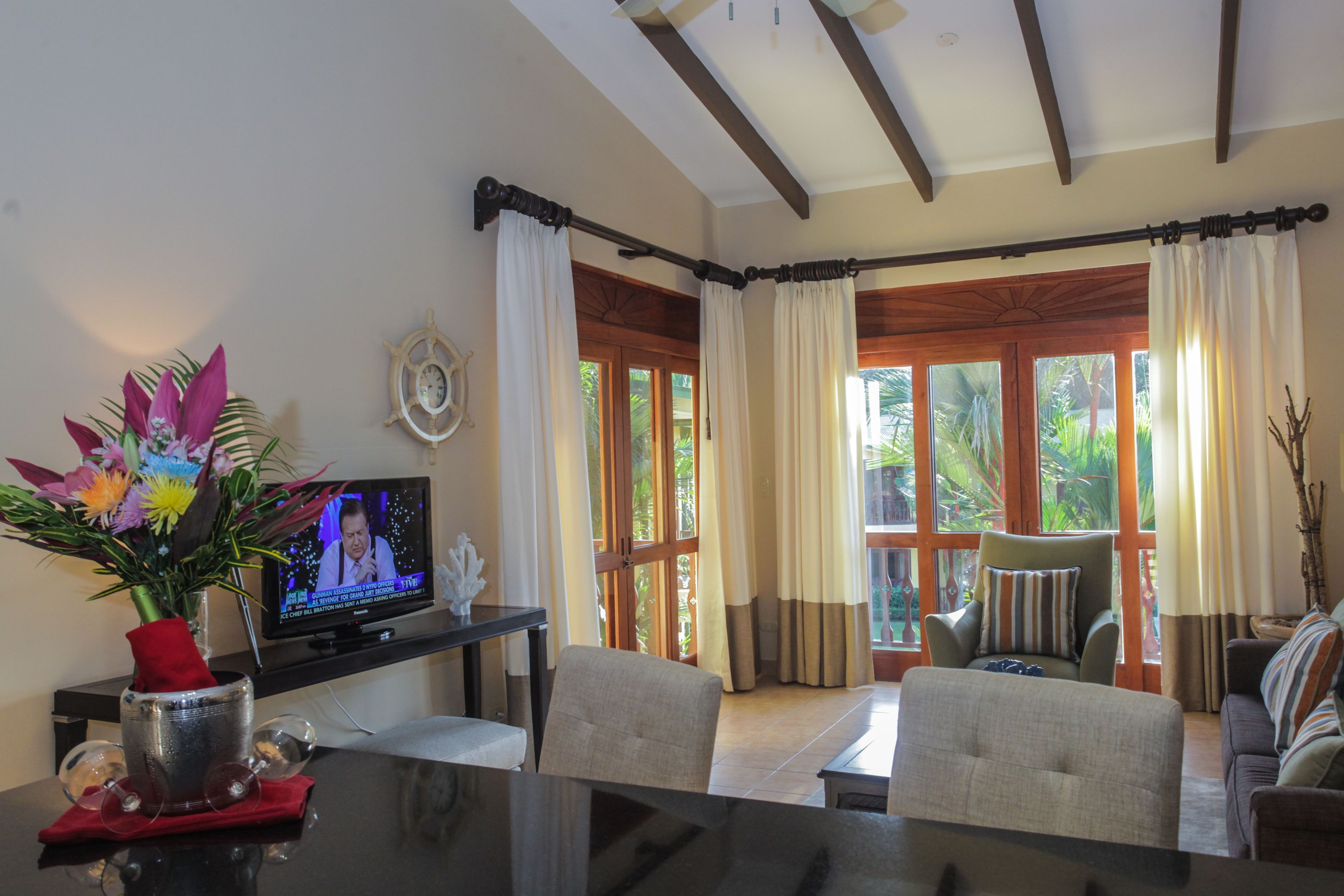 deluxe apartment, 2 bedrooms, pool view | living area | 29-inch flat-screen tv with cable channels, tv, dvd player