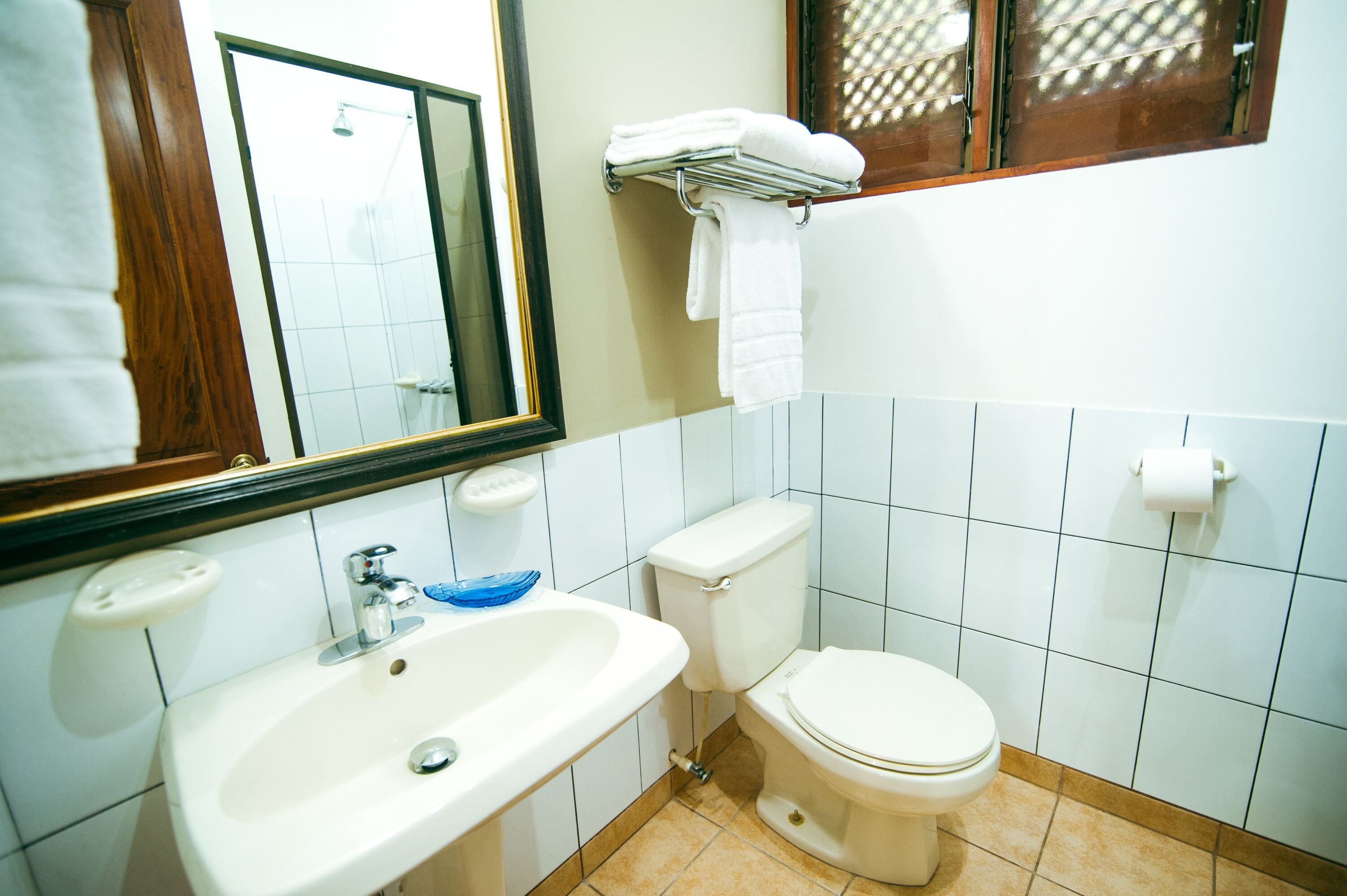 premium condo, 2 bedrooms, balcony, pool view | bathroom | shower, free toiletries, hair dryer, towels