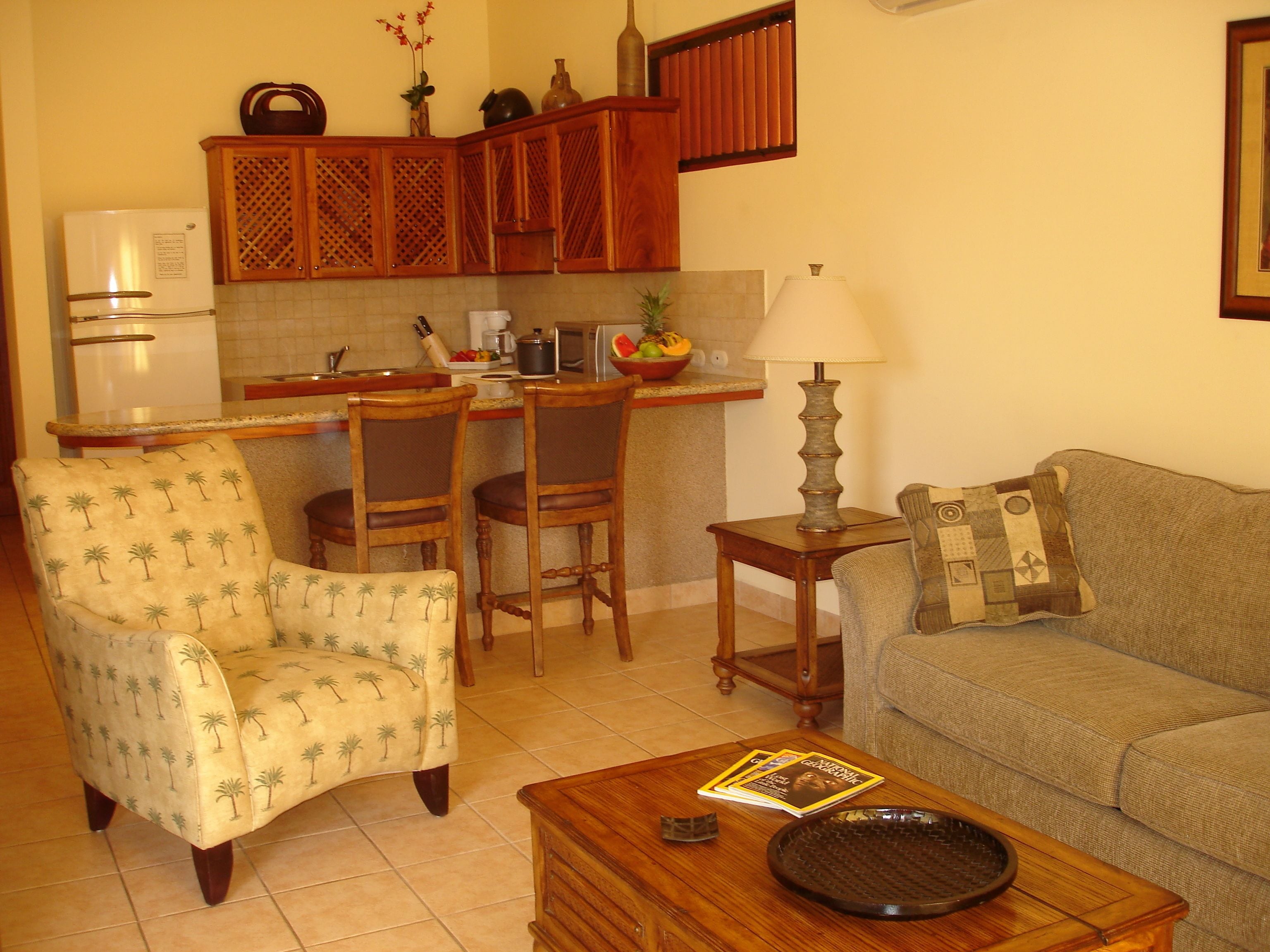 deluxe apartment, 2 bedrooms, pool view | living area | 29-inch flat-screen tv with cable channels, tv, dvd player