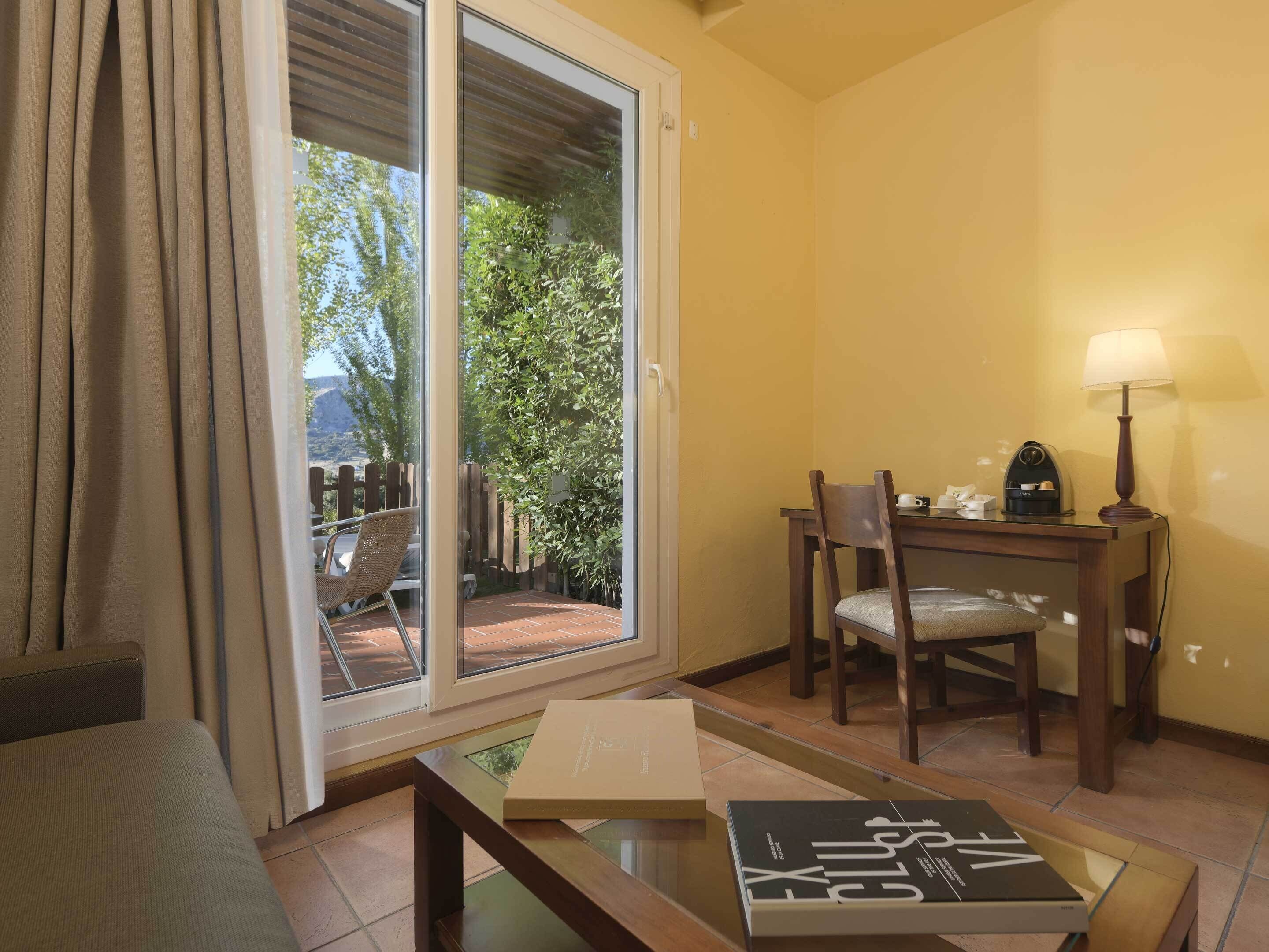 exclusive double room, mountain view | living room | 32-inch flat-screen tv with cable channels, tv