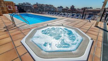 Outdoor pool, sun loungers