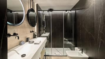 Designer toiletries, hair dryer, bidet, towels