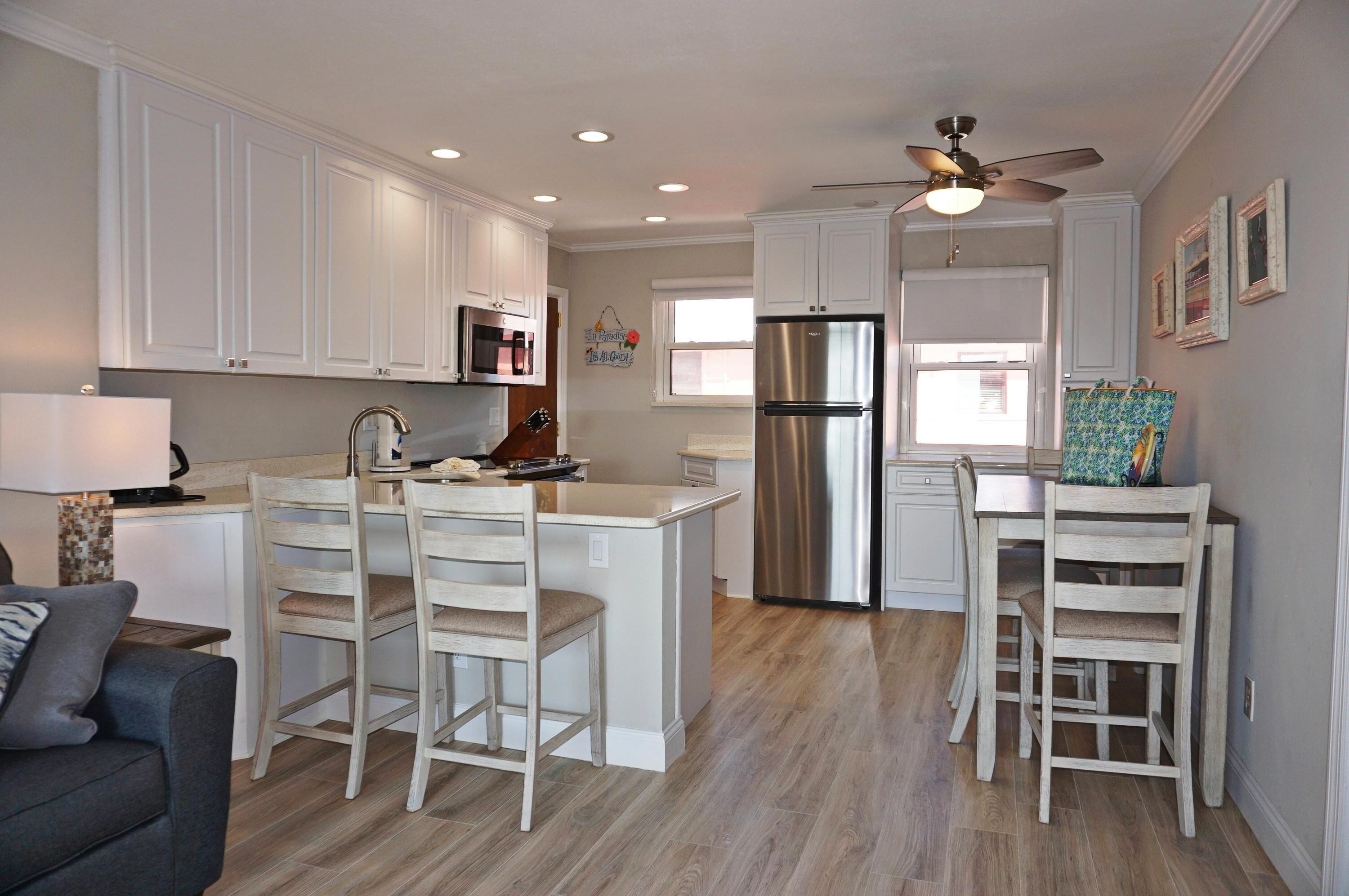 Condo, 2 Bedrooms, Kitchen | Private kitchen | Fridge, microwave, coffee/tea maker, cookware/dishes/utensils